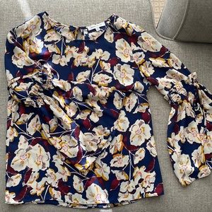 Floral blouse with statement bell sleeves, size M